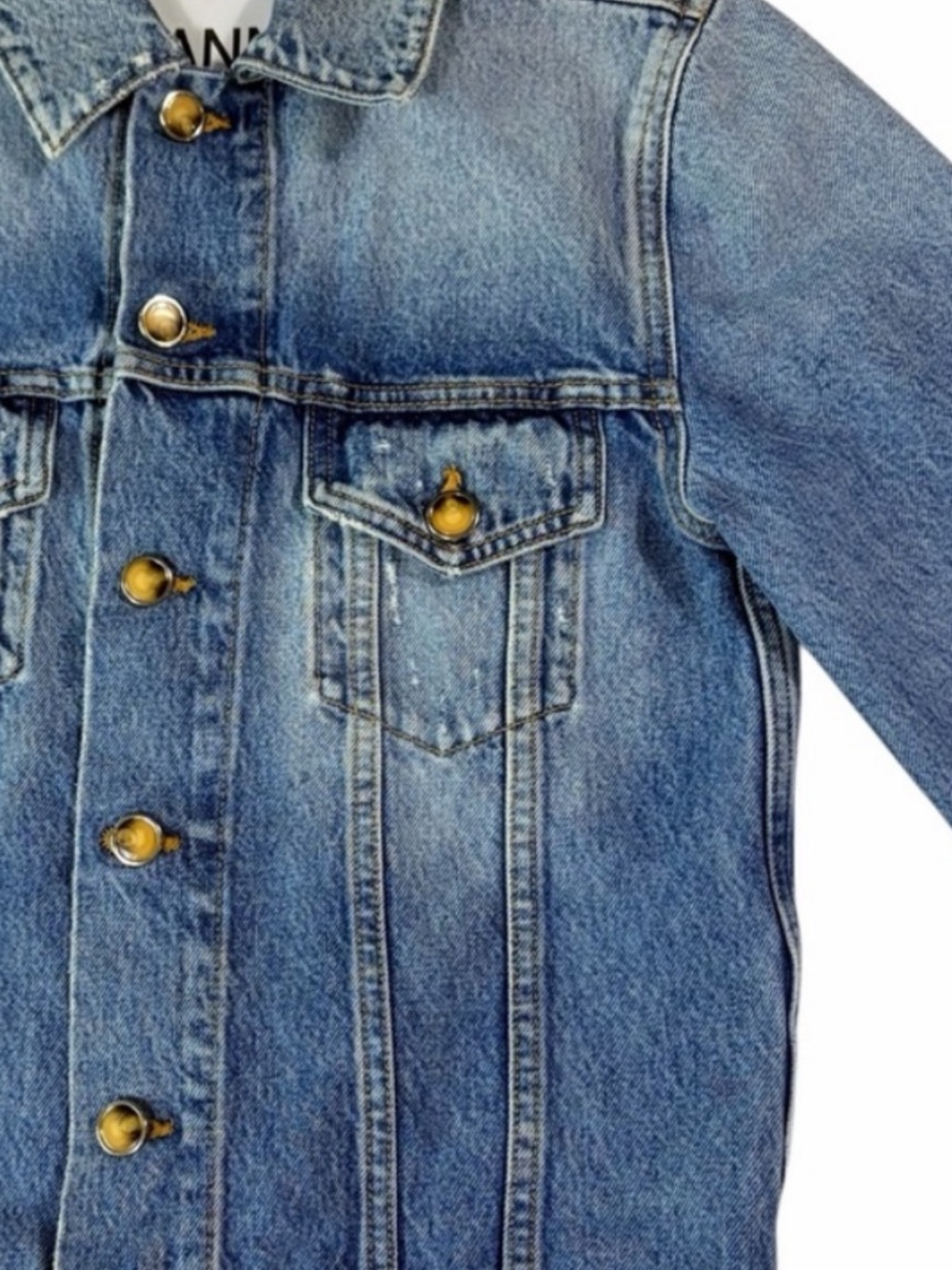 Ganni Blue Denim Truckers Jacket with Unique Tigers Eye Style Buttons and Detail